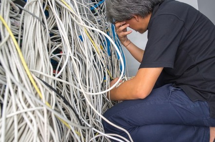 Sysadmin clutching his head
