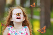 A child with a butterfly, from shutterstock