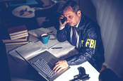 FBI agent on a phone