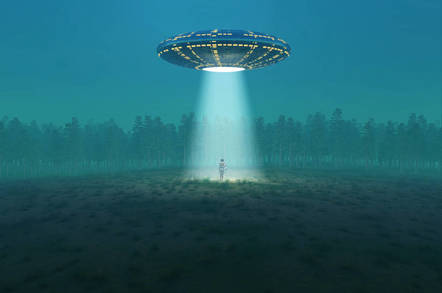 A flying saucer in a field