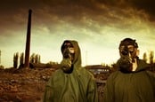 People wearing biohazard suits after nuclear explosion