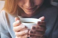 Women smelling coffee