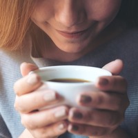 Women smelling coffee