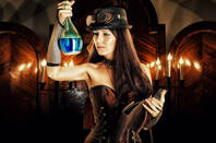 Steampunk alchemist holding a potion