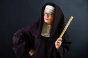 A mean looking nun with a ruler
