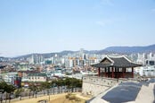Hwaseong fortress wall - 18th century ramparts built by King Jeongjo in the foreground of Korea's Suwon City - where Samsung has a manufacturing plant