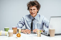 weeping techie with crumpled coffee cups 