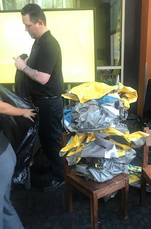 Restaurant staff tearing down IGEL's branding near VMworld 2018