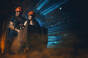 Two miners (cosplay) carrying coal up "mine shaft" - 