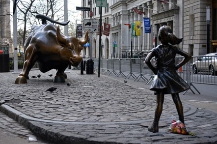 Statue of girl confronting Wall Street bull