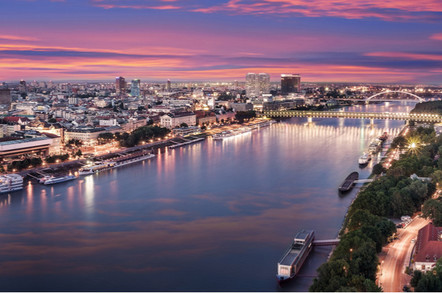 Aerial panorama of Bratislava, new bridge over Danube river with evening lights in capital city of Slovakia,Bratislava