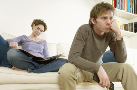 couple watches tv.