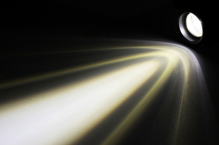LED flashlight with a light beam at night