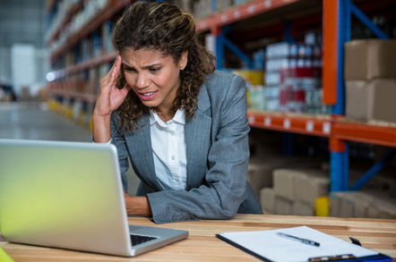 stressed exec at warehouse