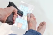 Man shooting himself in the foot overlaid with Windows Phone image