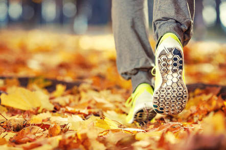 man runs on leaves