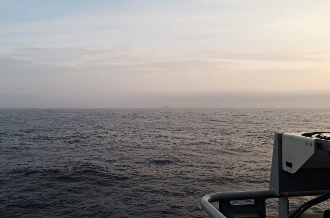 The Arctic Sea, with the USS New York as a distant blot on the horizon. Pic: Gareth Corfield