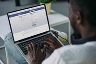 Man using Facebook