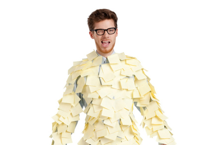 man covered in sticky notes 