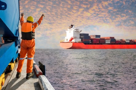 dock worker overjoyed to see container laden ship