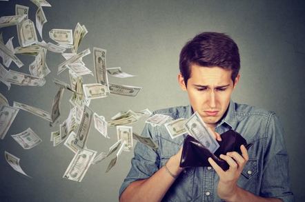 Man watching money flow from his wallet