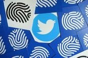 Twitter logo and fingerprints