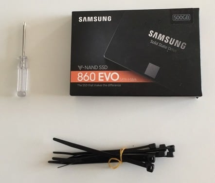 SSD, screwdriver and cable ties - aka PC tools - by verity stob