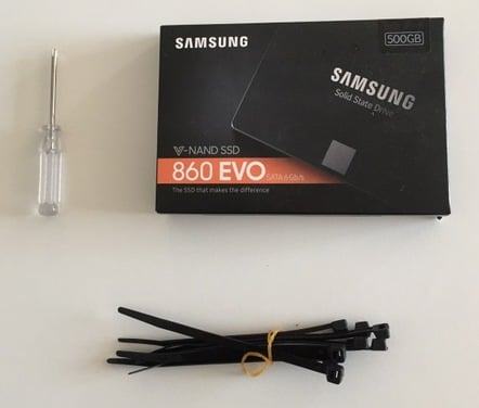 SSD, screwdriver and cable ties - aka PC tools - by verity stob