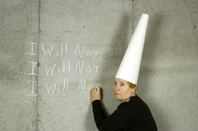 woman with dunce cap