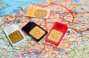 SIM cards with Europe map in background