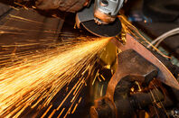 Blacksmith, knife sharpening, sparks, metal. 