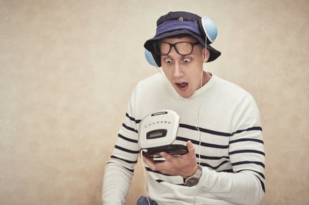 hipster shocked at compact disc player