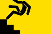 man falls backwards down stairs 
