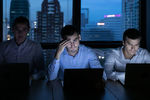 power down lights out people working in the dark on battery powered laptops