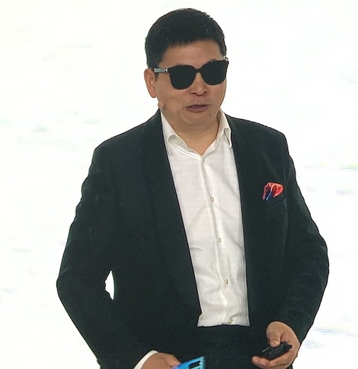 Richard Yu modelling Smart Glasses