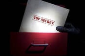 Stealing top secret folders- photo from shutterstock