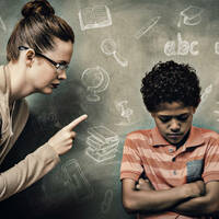 A teacher schooling some kid