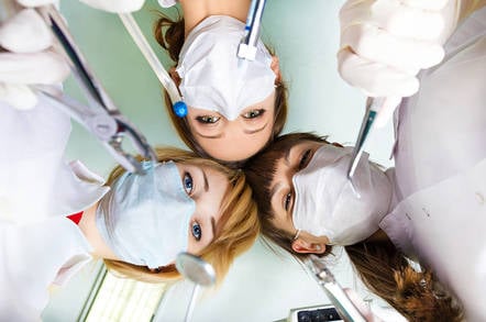 Doctors standing over you