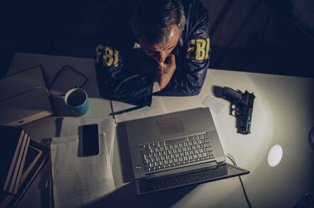 F-B-Yikes! FBI bod allegedly hid spy camera under desk to ...
