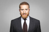 man with beard in suit undergoes facial recognition scan