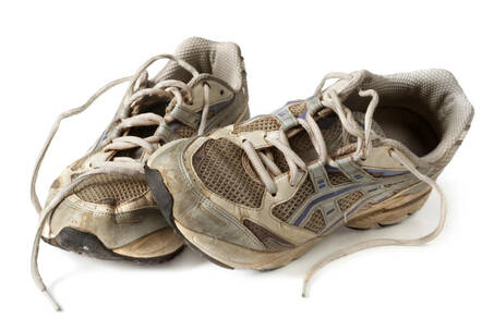 A worn pair of running shoes