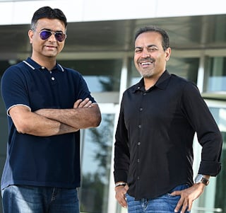 Avinash Lakshman (left) and Sanjay Mirchandani 