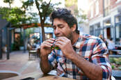 guy_eating_bagel