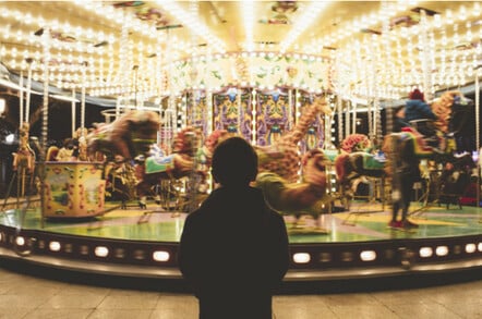 Child looking at the carousel
