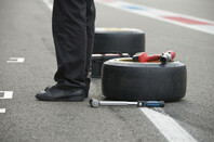 Pit crew mechanic waiting to get into action