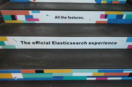 On the stairway at the Elastic event is an ad for the so-called official Elasticsearch experience