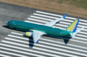 Boeing 737 NG doing some flight tests in the runway near the company factory at Renton Airport