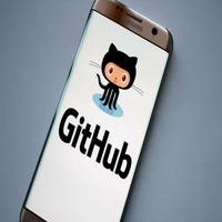 GitHub logo on phone