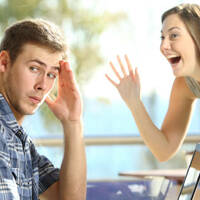 Someone annoying another through a glass window 