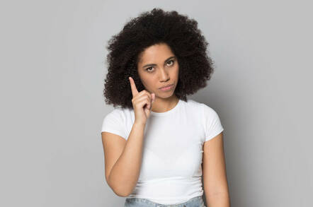 A woman taking a threatening posture